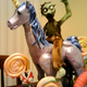 Illustration for article titled There is nothing better than the unicorn-riding rainbow zombie cake